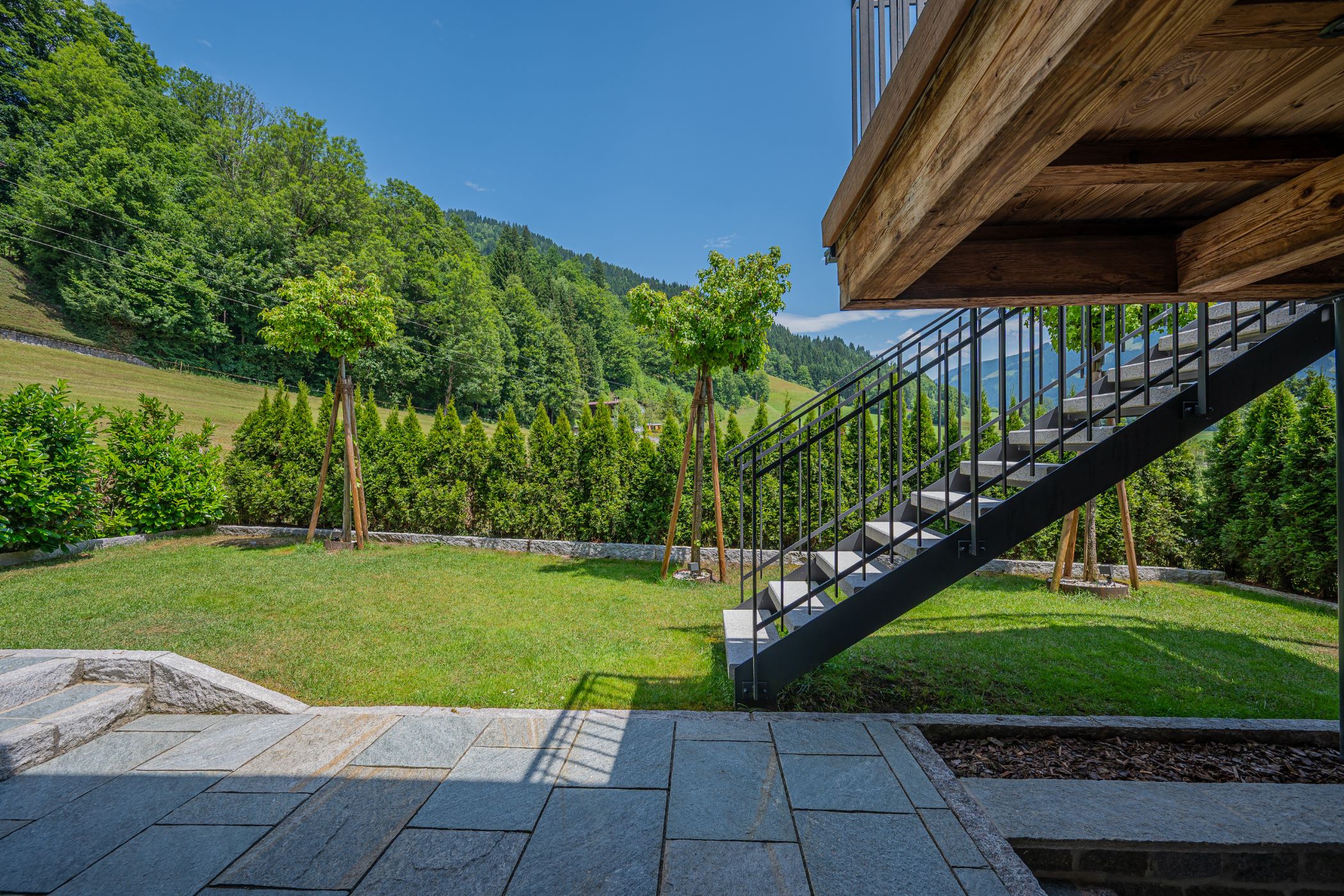 A mountain chalet in Westendorf, Tyrol, looking across the Brixental valley to the Kitzbühel Alps